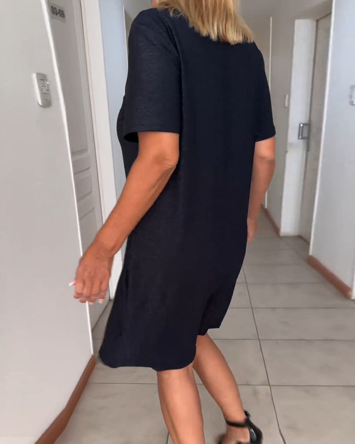 Nora | Stylish dress with deep neckline